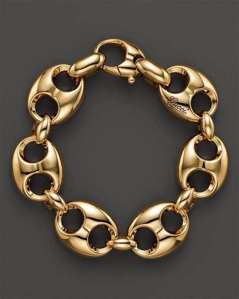 gucci gold jewellery bracelet.